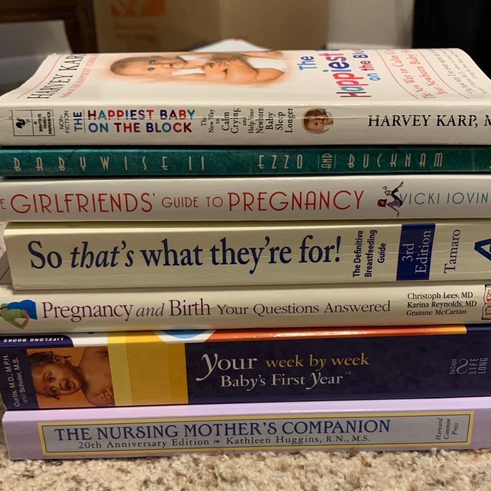 Set of pregnancy, baby and nursing books.